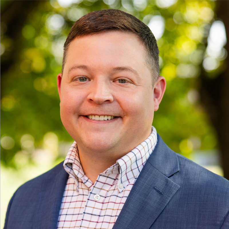 Headshot of Tyler Reich BA'06