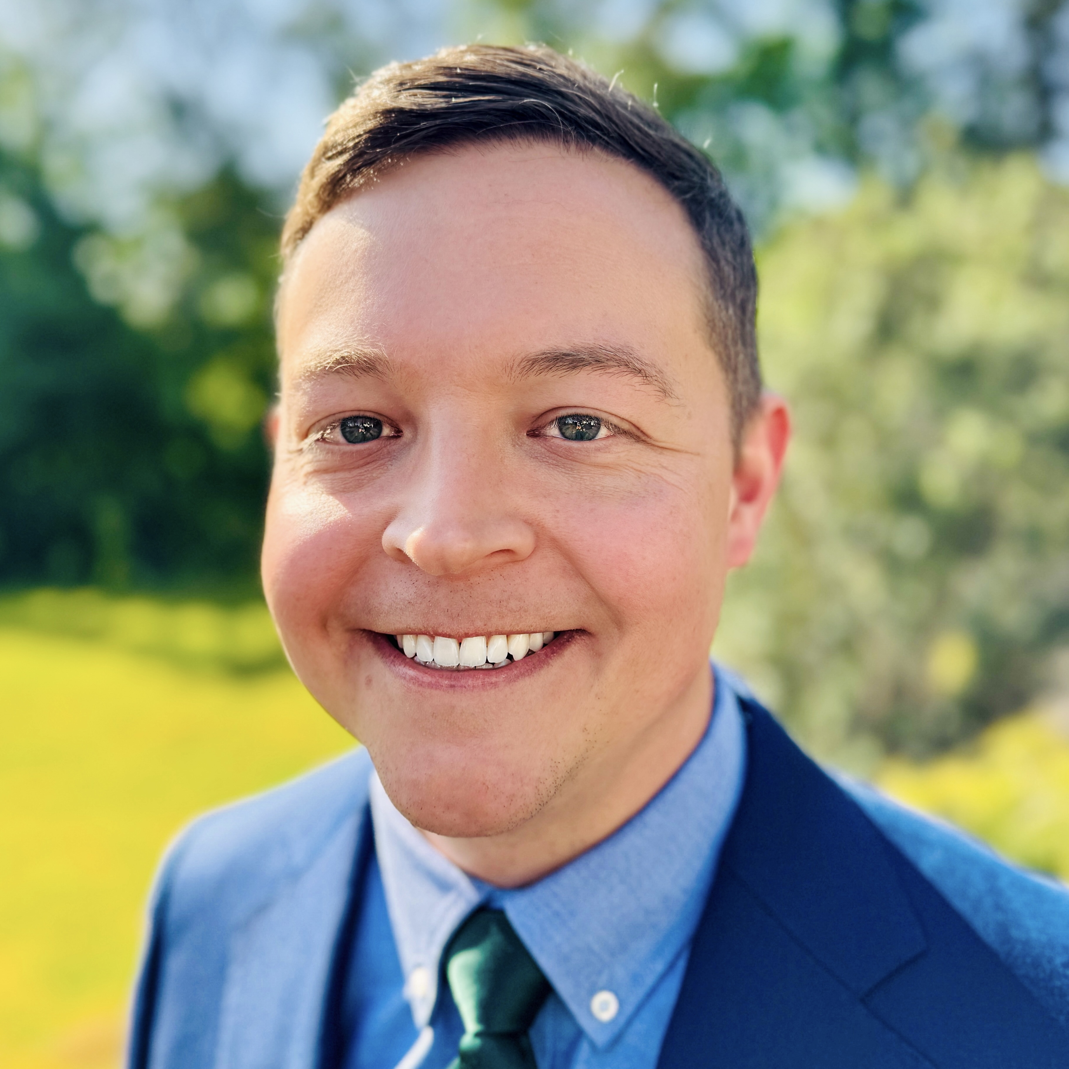 Headshot of Tyler Reich BA'06