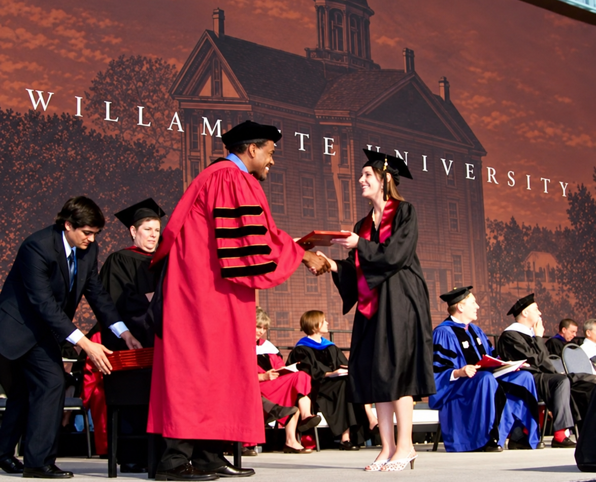 Chelsea Venable BA'10 receiving her diploma from former Willamette President Lee Pelton